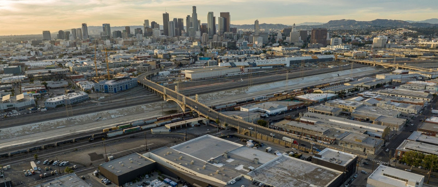 Aerial view of downtown Los Angeles skyline representing cannabis property owner services in LA